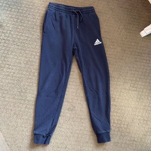 Men’s size S navy blue cotton Adidas joggers with pockets and back pocket.